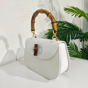 Gucci Vintage White Bamboo Handle Bag – Dina C's Fab and Funky Consignment  Boutique