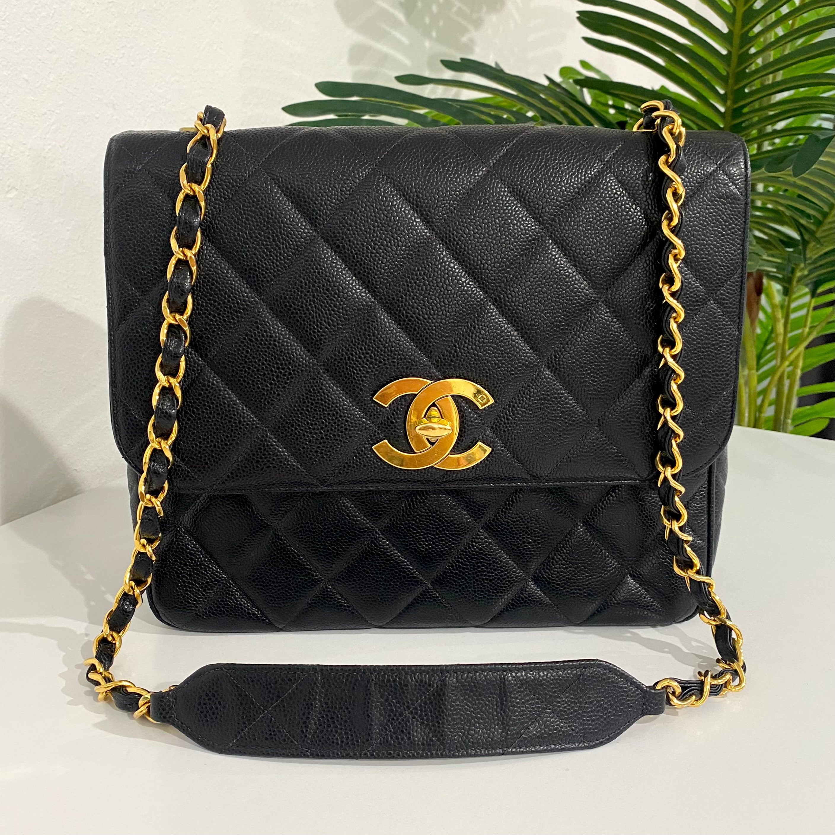 Lot - A Chanel vintage black calfskin square quilted East West flap bag  circa 2005-2006