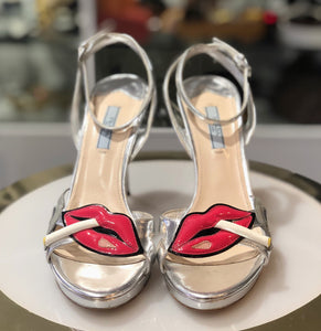 Prada lips and cigarette heels