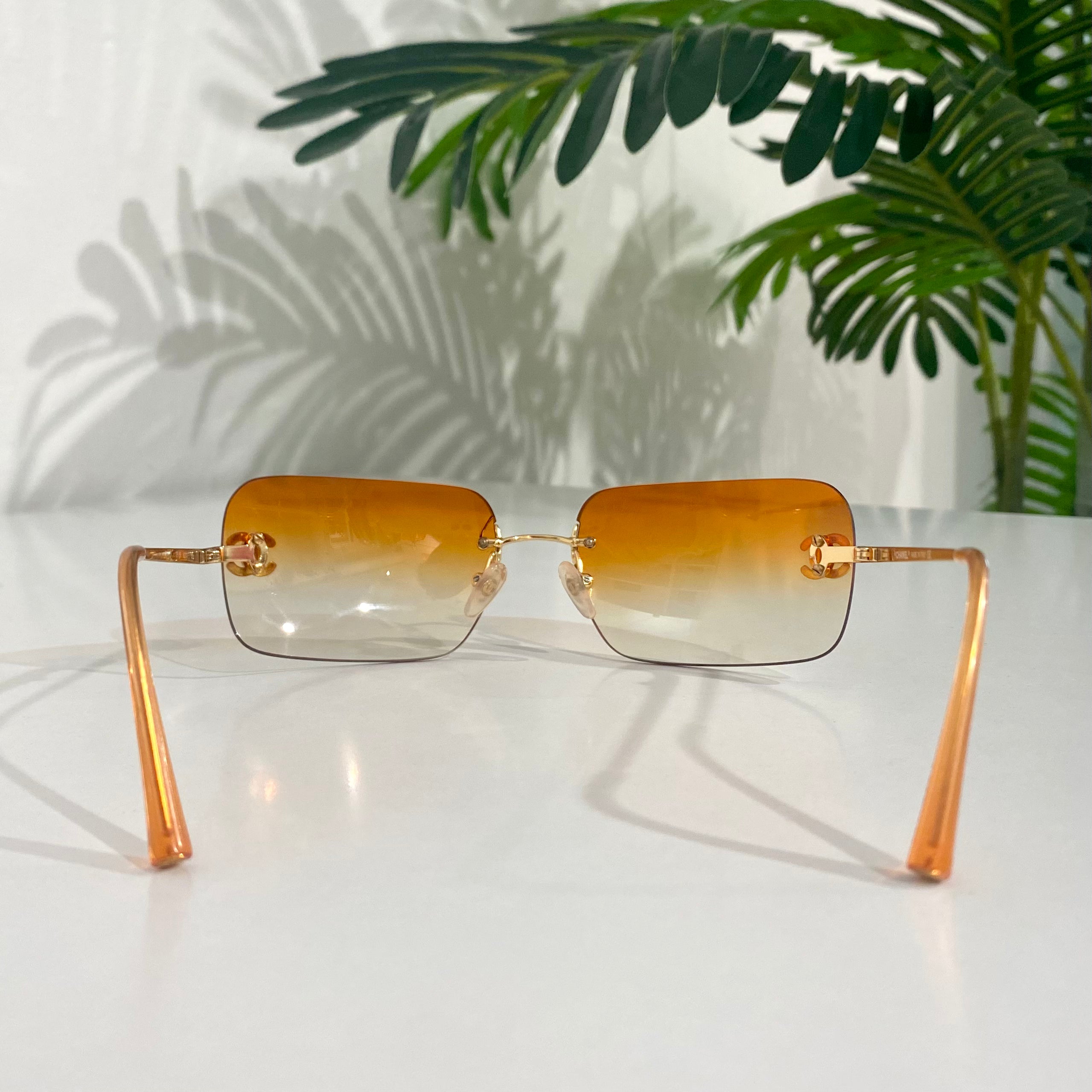 Chanel Vintage Orange Rimless Sunglasses – Dina C's Fab and Funky Chanel Vintage Orange Rimless Sunglasses – Dina C's Fab and Funky