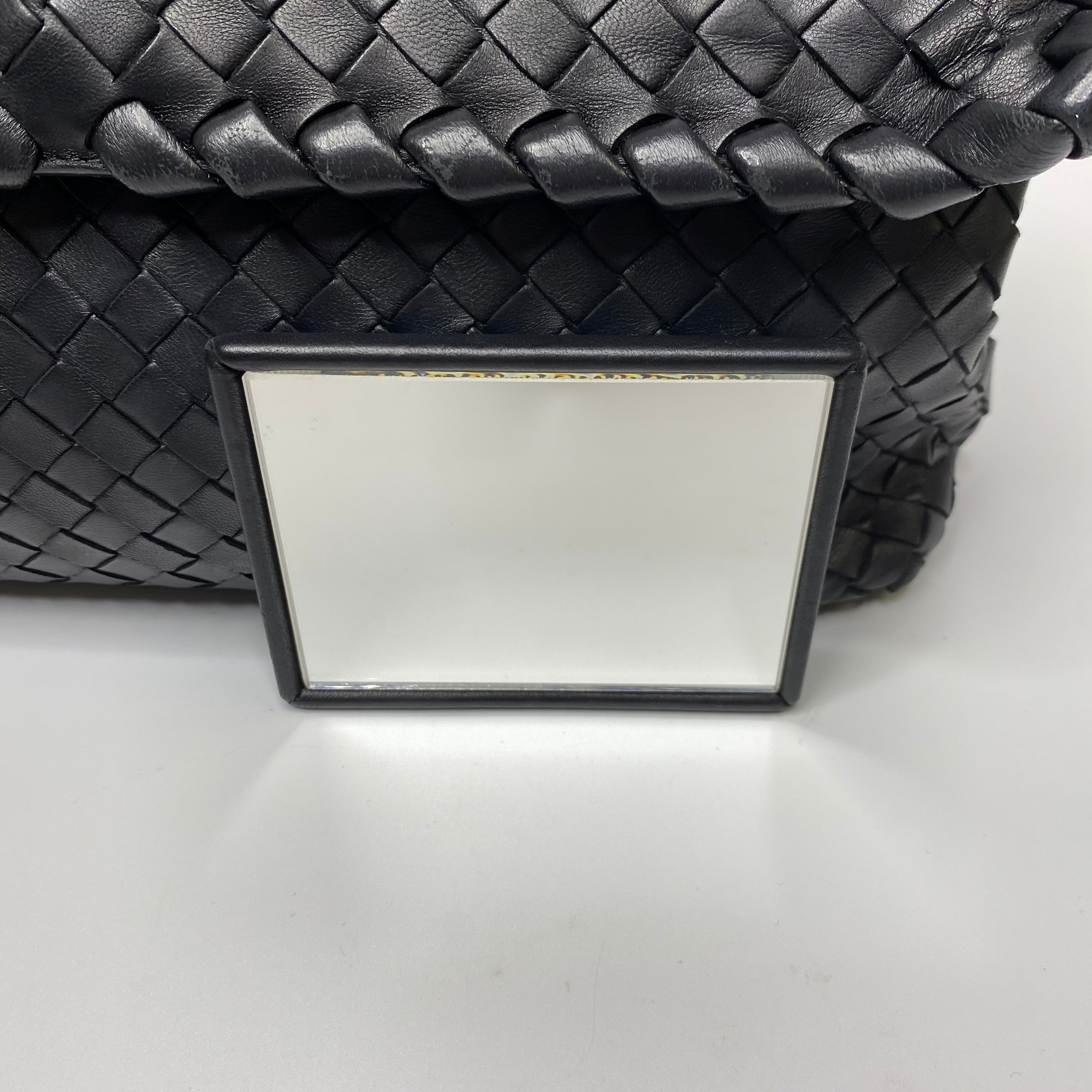 Authentic Bottega Veneta Black Solid Leather Bag on sale at JHROP. Luxury  Designer Consignment Resale @jhrop_official