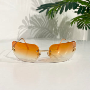 Chanel Vintage Orange Rimless Sunglasses – Dina C's Fab and Funky