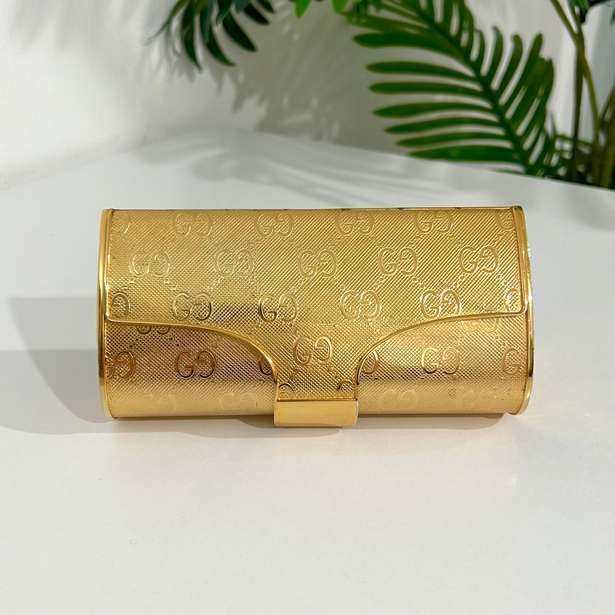 Gucci top gold clutch