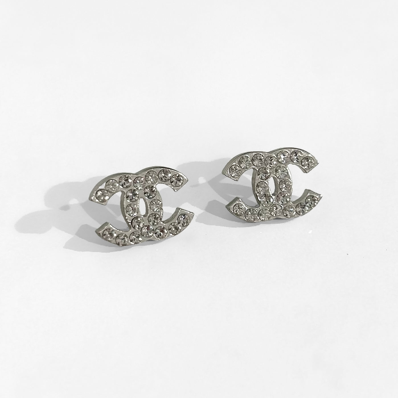 Chanel CC Huggie Silver and Crystal C Hoop Earrings – Madison Avenue Couture