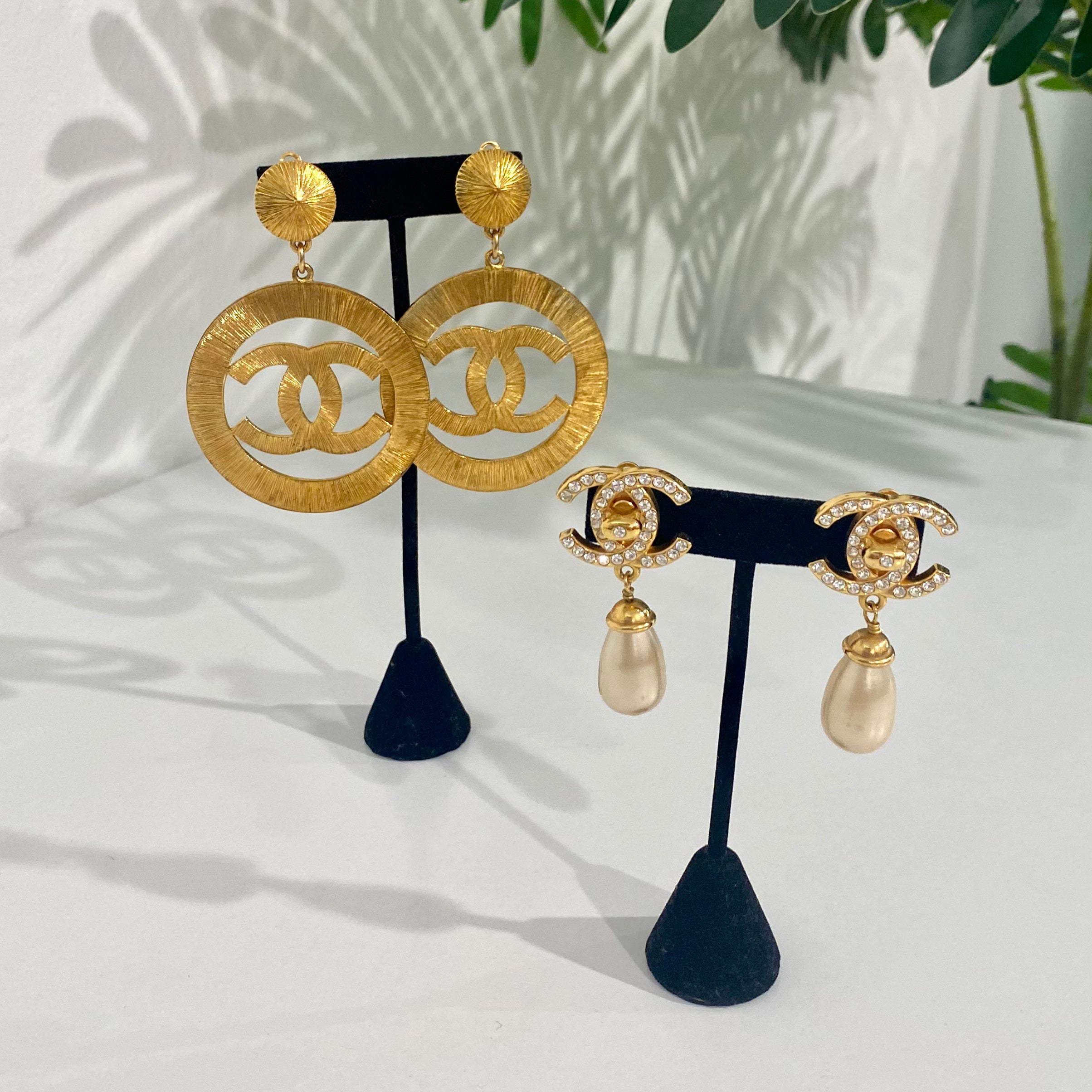 Chanel Vintage 1992 Gold Toned Jumbo Sunburst Textured CC Logo Dangling  Earrings at 1stDibs